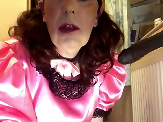 Humiliated pink sissy maid cock...